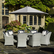 Bramblecrest Monterey 220 x 145cm Elliptical Dining Set with Parasol & Base