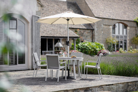 Bramblecrest Zurich Round 4 Seater Dining Set with Parasol & Base